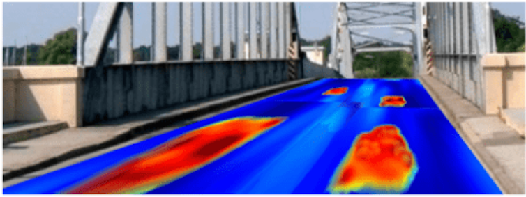 What a scan looks like, with sections in red showing defects in the road lanes.